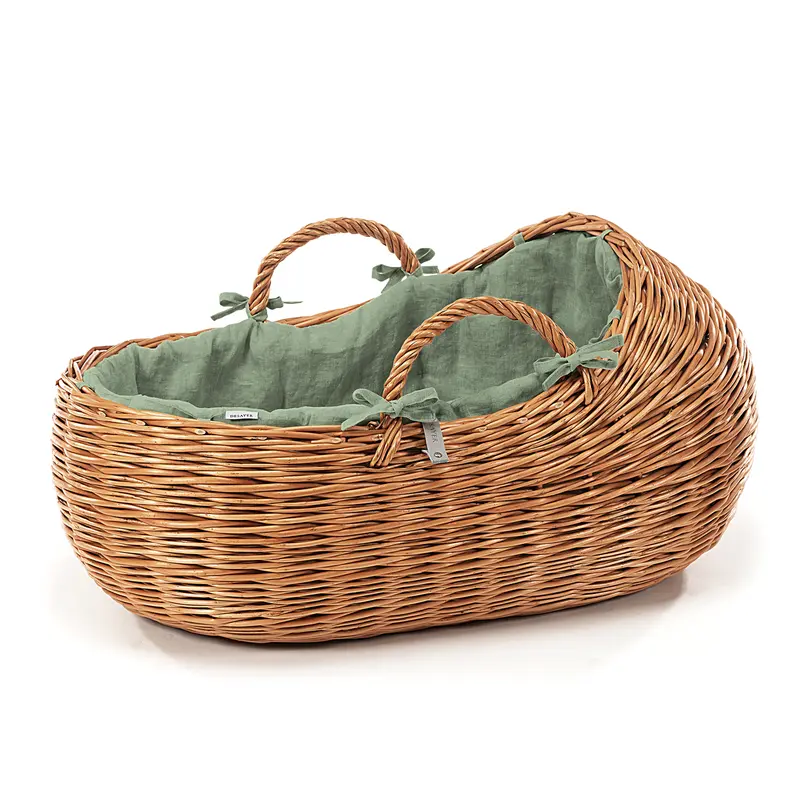Desayer wicker Moses basket for babies with green trim, handles, and mattress TheWickerStories