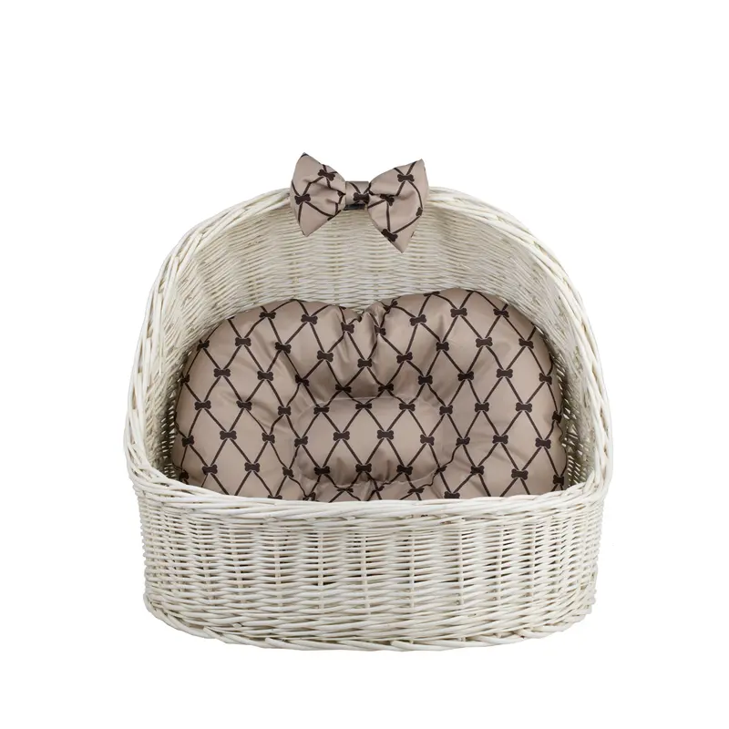 Elsa wicker pet bed basket with beige cushion and bow TheWickerStories