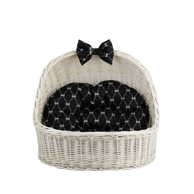 Elsa wicker pet bed basket with black cushion and bow TheWickerStories