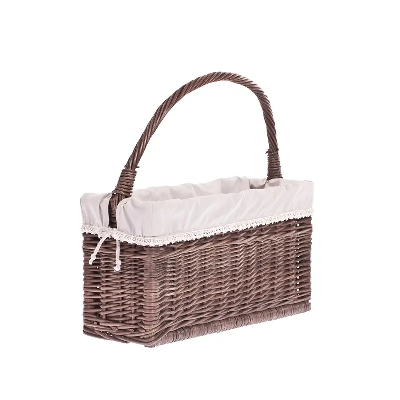 Gavis wicker magazine basket with beige trim and handle TheWickerStories