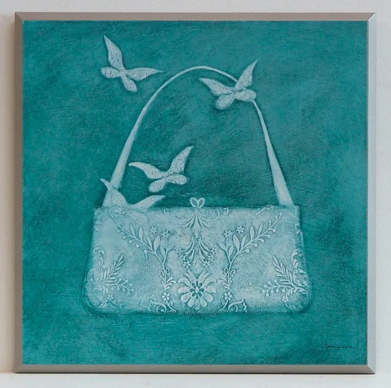 Obraz Biała koronkowa torebka na zielonym tle 31x31 cm