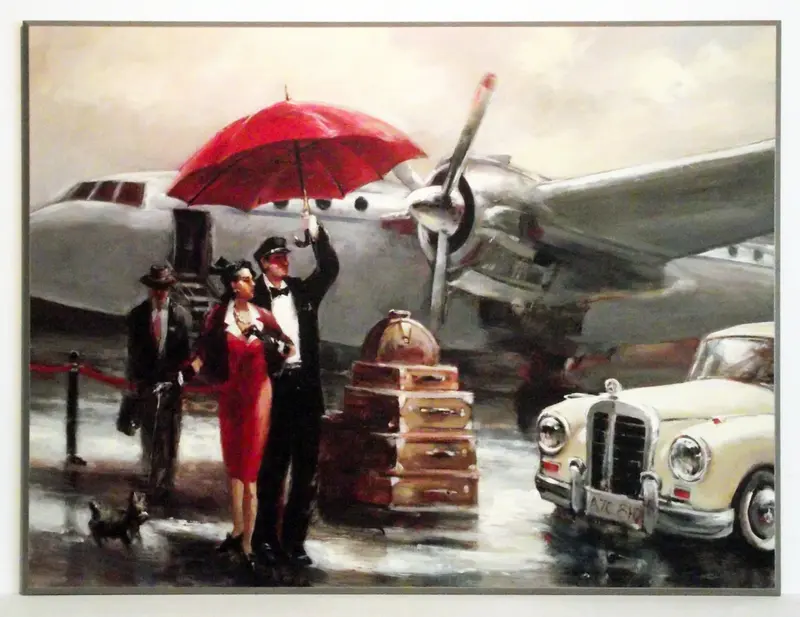 Obraz Para pod czerwonym parasolem na lotnisku na płycie 81x61 cm