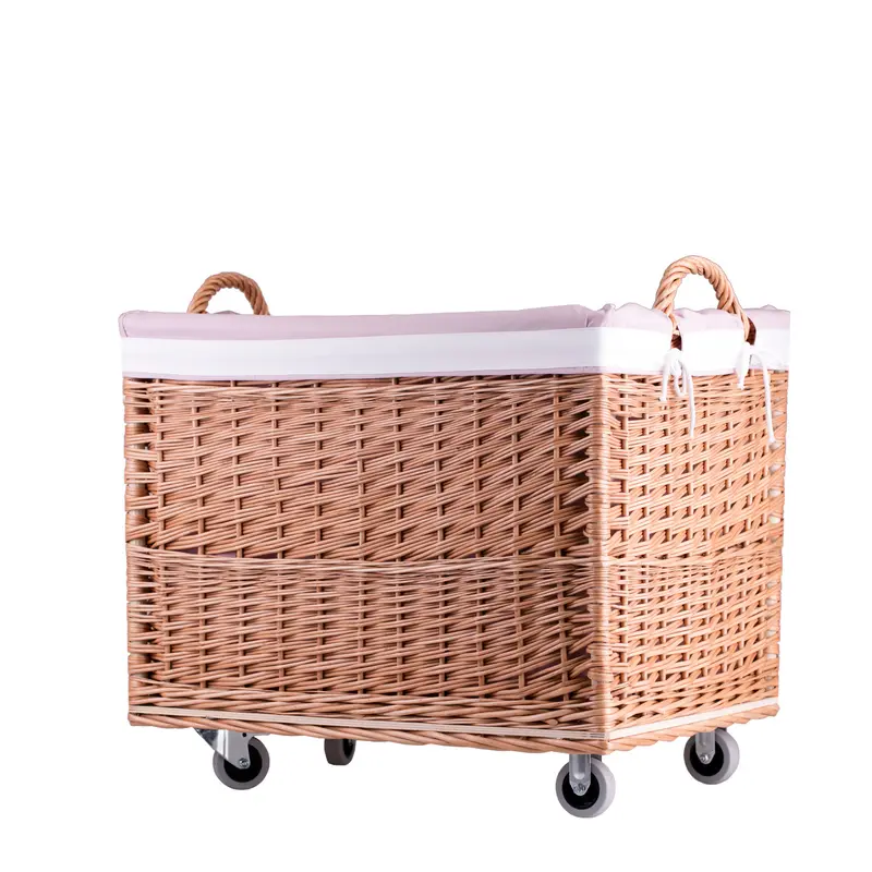 Salux wicker basket with pink lining and wheels TheWickerStories