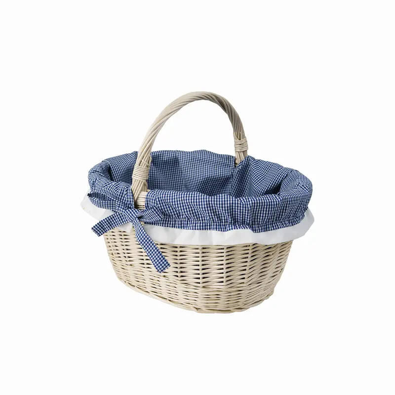 Walerissa wicker shopping basket with navy trim and handle TheWickerStories