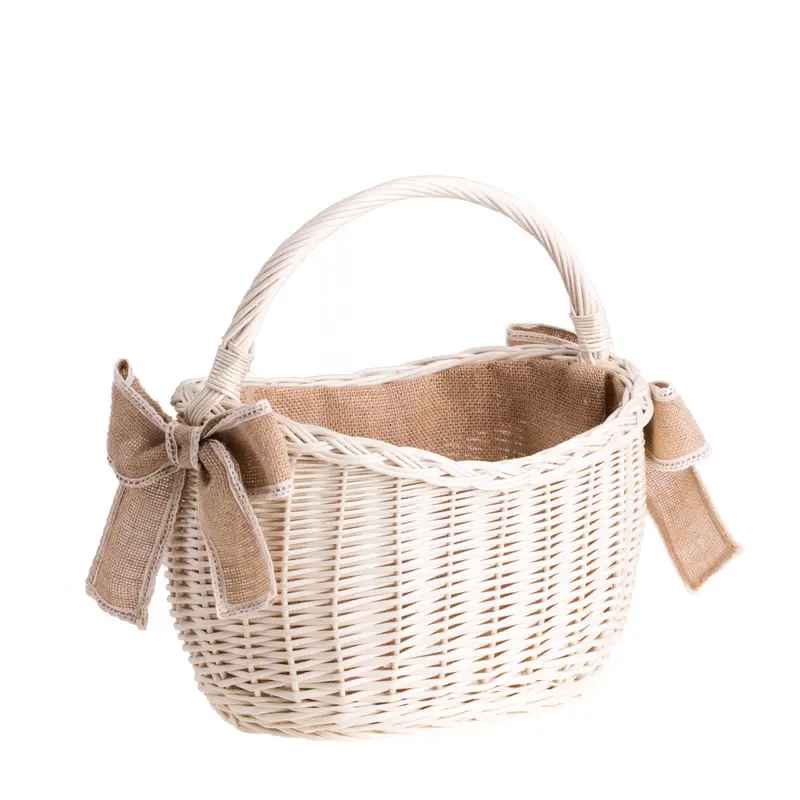 Wavellia wicker shopping basket with jute trim, handle, and bows TheWickerStories