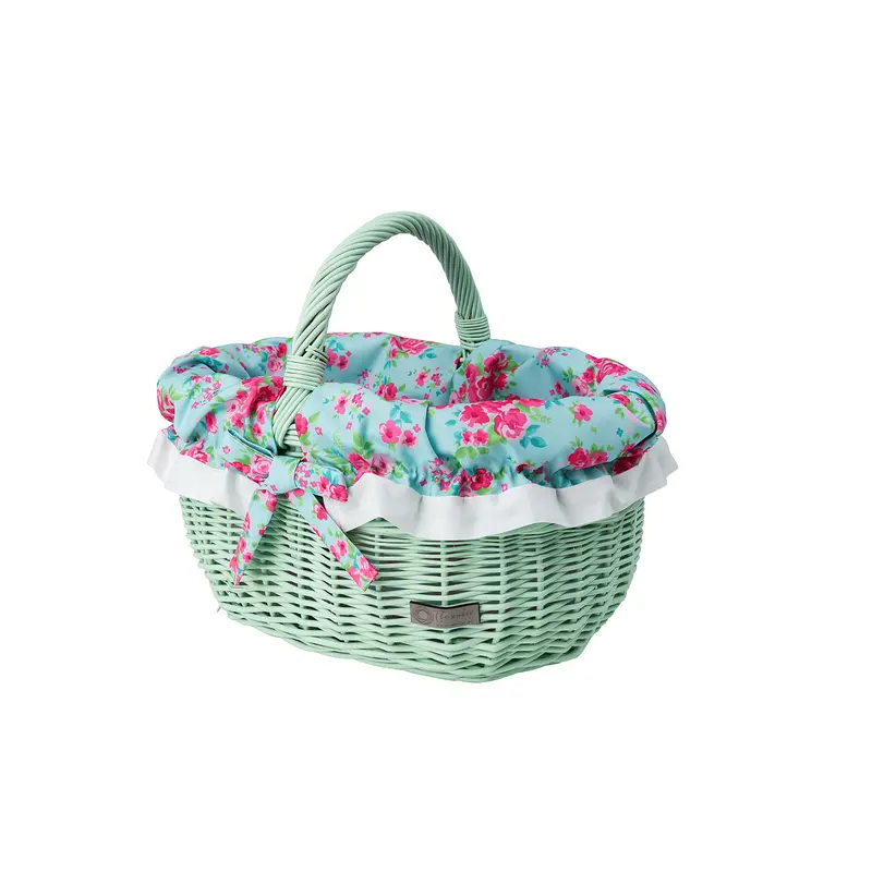 Werburga shopping basket with a wicker handle and green trim TheWickerStories