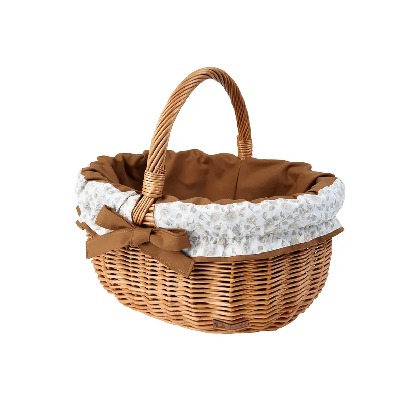 Werburga wicker shopping basket with brown trim and handle by TheWickerStories