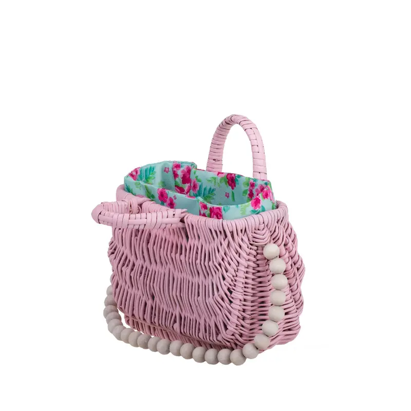 Werlissa wicker basket-handbag for women with mint trim, handle, and decorative beads TheWickerStories